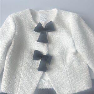 Elegant White Kids Jacket with Black Bows